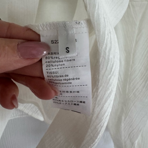 NWT SDEER Women's  Asymmetrical Blouse size small
Color- white - Picture 8 of 10